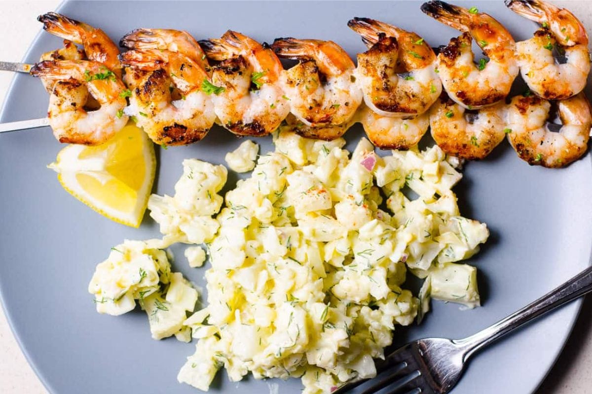 Shrimp skewers on a plate.