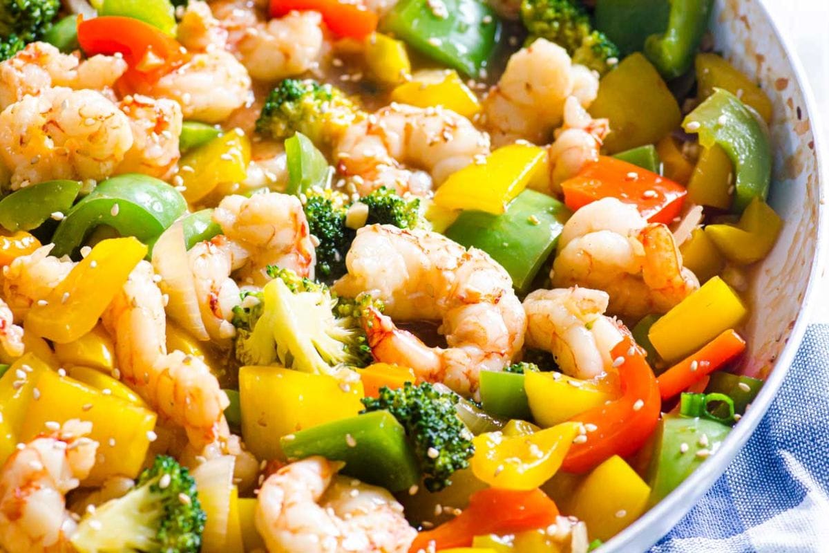 Shrimp and veggies in a bowl.