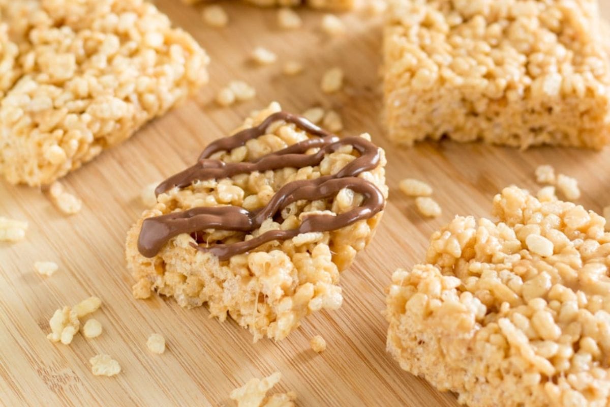 Rice krispies on a wooden surface.
