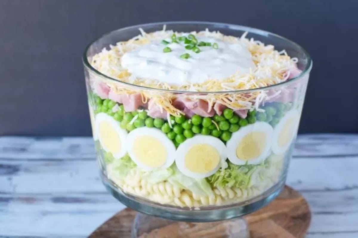 Ham and cheese salad in a glass bowl.