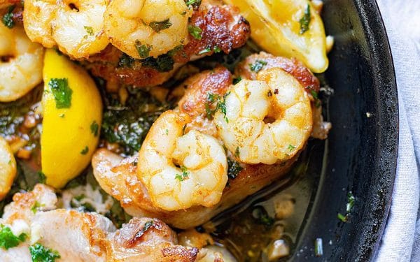 Buttery shrimp on top of pork chops.