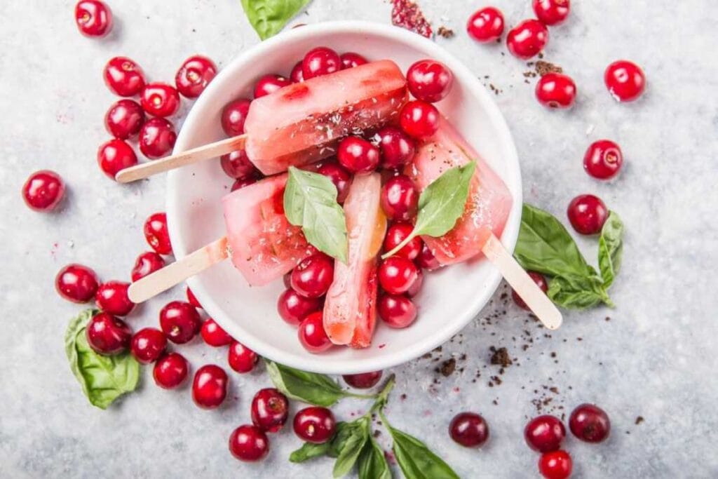 Cherry Pineapple Popsicles.