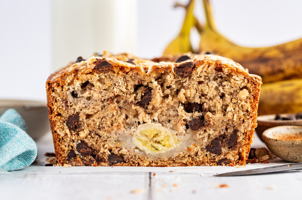 chocolate chip banana oatmeal bread with banana in middle