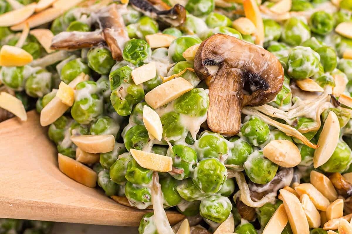 Pea salad with mushrooms and almonds.