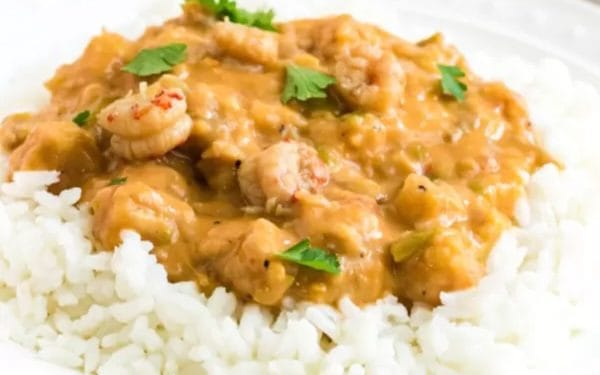 Rice with crawfish etouffe on top.