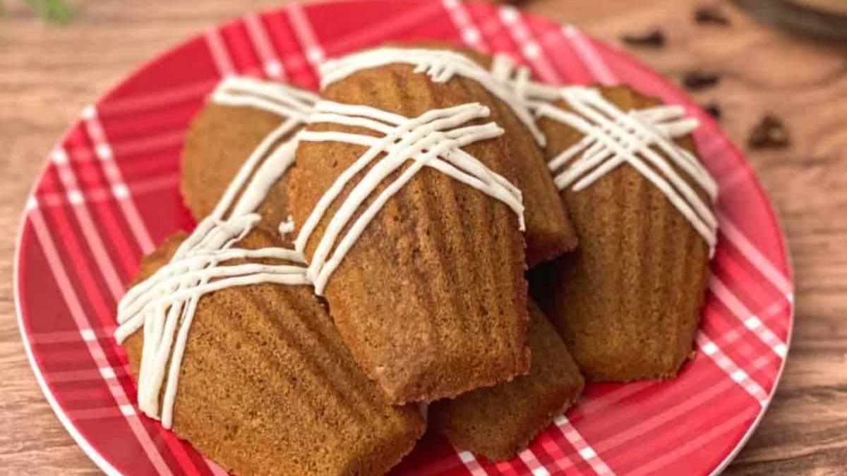 A plate of cinnamon rolls with icing, perfect for those craving a delicious treat.
