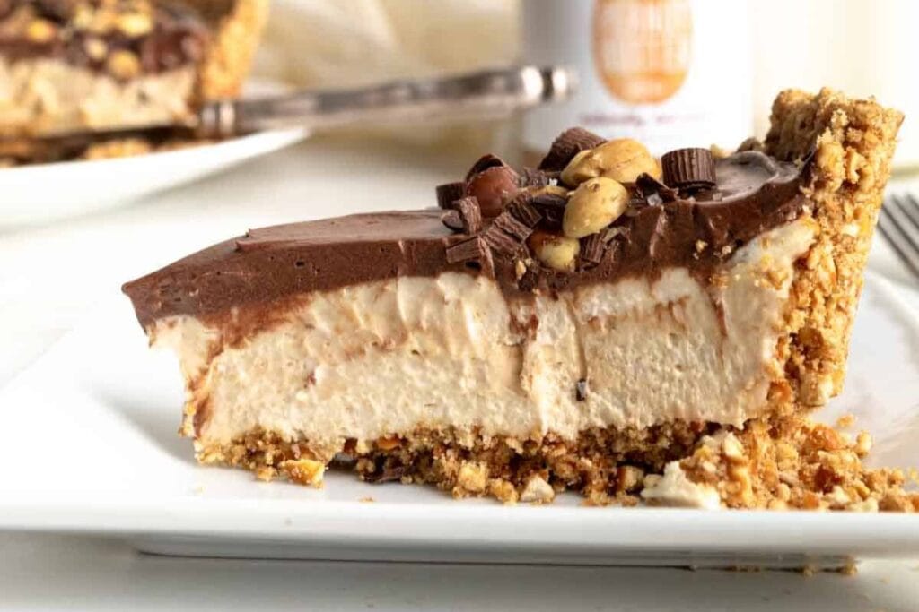 Peanut Butter Pie With Chocolate Topping And Pretzel Crust.