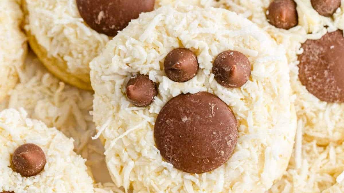 A plate of cookies with chocolate paw prints on them, perfect for a shared roundup or cookie recipes gathering.