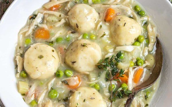 Chicken with dumplings on top.