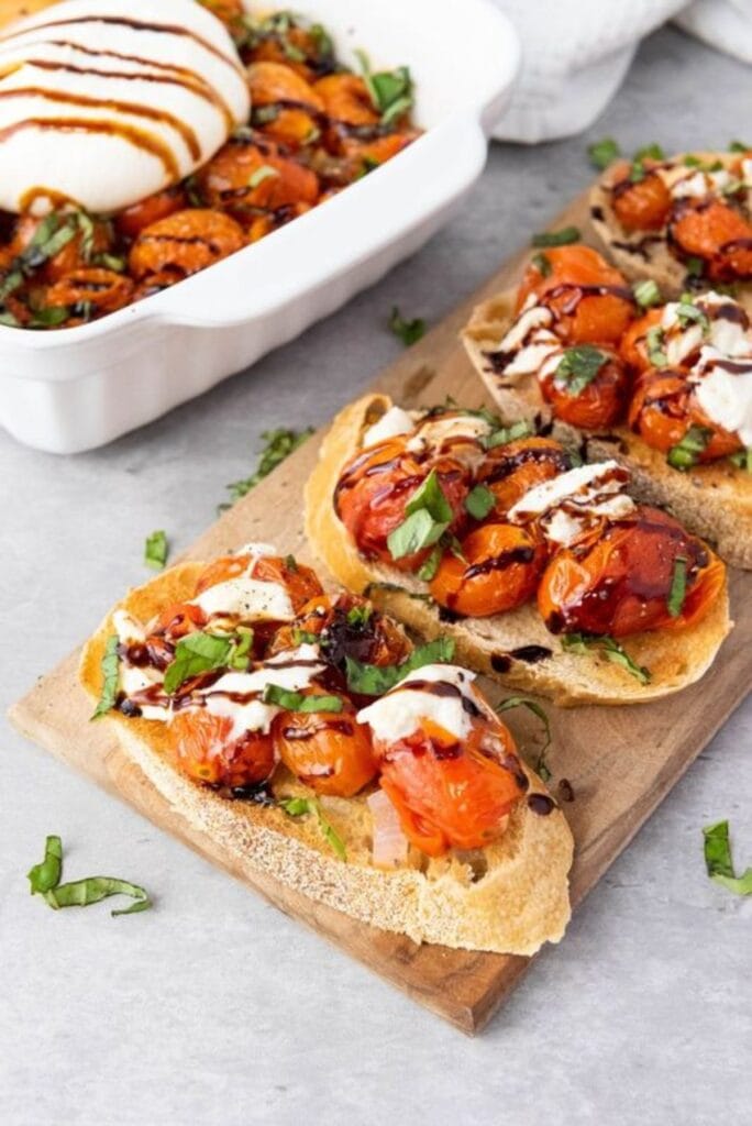Bruschetta with burrata and cherry tomatoes.