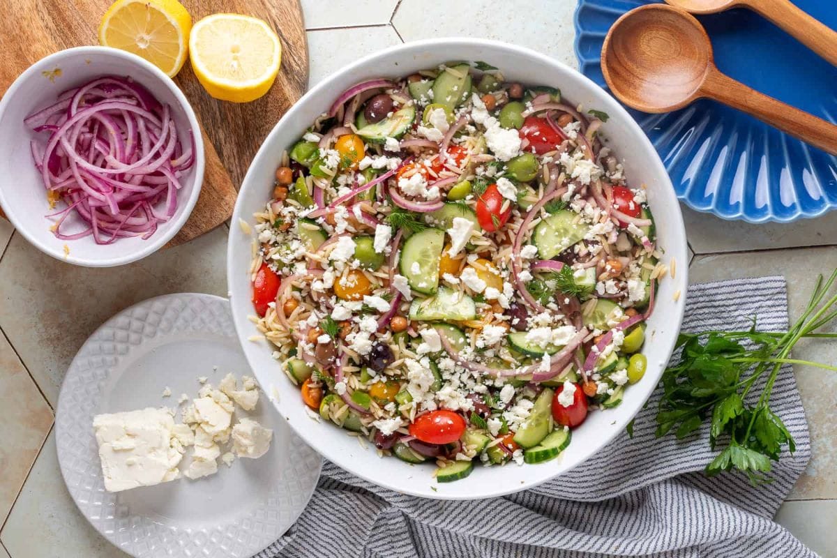Greek orzo pasta salad in a serving dish..